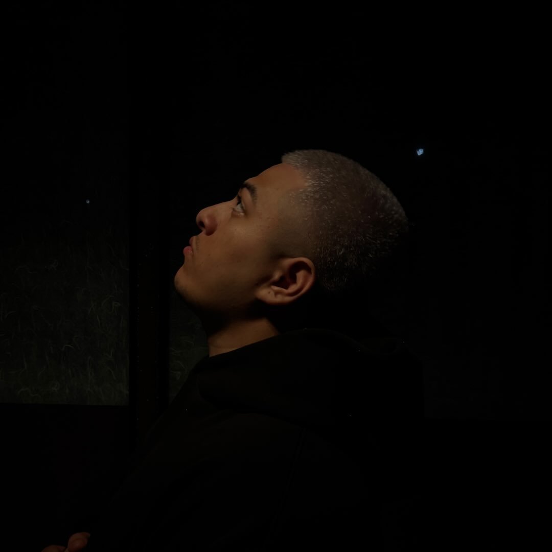 Lucas Delcid, portrait in low light